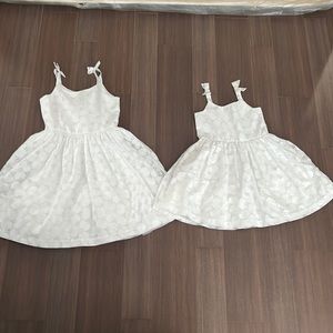 2 beautiful girls’ white floral dresses